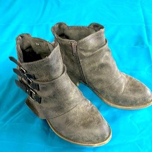 Two inch heel distressed faux leather buckled bootie